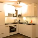 Апартаменты Caya Bijou Im Herzen Von